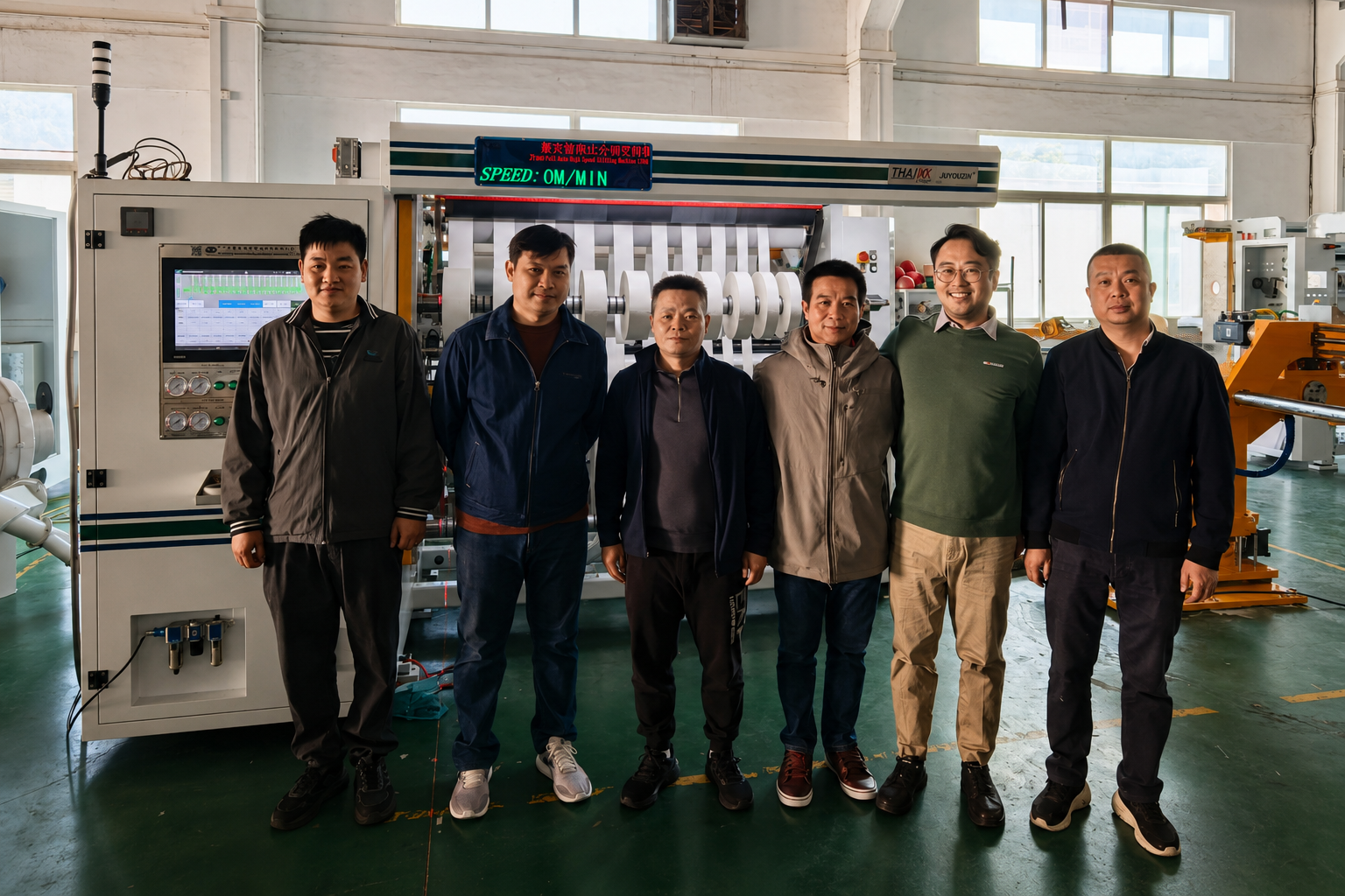 Thai KK and JUYOU teams together in front of the SF-850 during factory acceptance in China